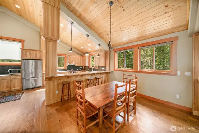 Cozy breakfast nook off kitchen and bar.