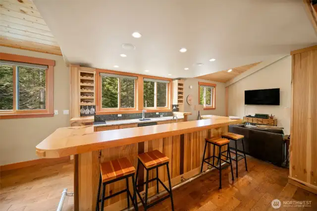 Hand made bar top with rich hickory cabinets throughout the top floor.