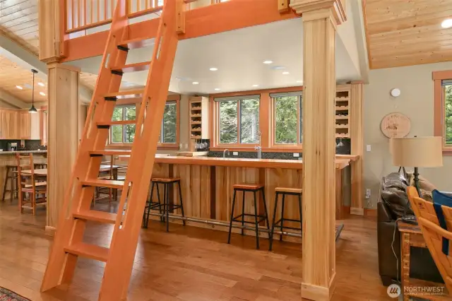 Loft above the bar with handmade alder wood ship ladder access.