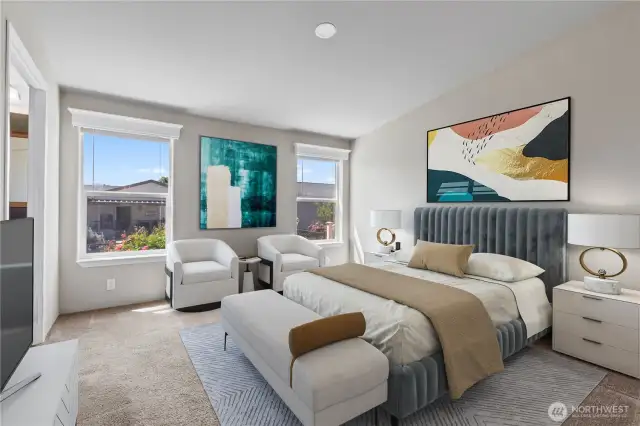 Bright and spacious primary bedroom virtually staged to showcase its full potential—featuring large windows, plush carpeting, and ample space for a sitting area. Located in Lacey’s 55+ Lakeview Meadows community, this retreat offers comfort and privacy in a thoughtfully upgraded home.
