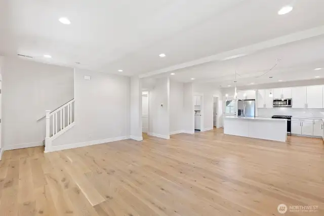 Head up the stairs to the private spaces of this lovely home.
