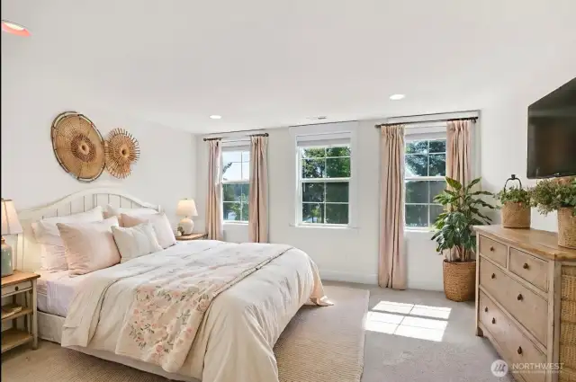 The East facing primary bedroom (virtually staged) has a large view.  Wake up to the sounds of the sea.