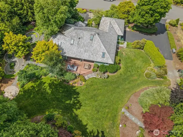 View of the backyard, zen garden, back deck and garden space.  Create the backyard of your dreams!