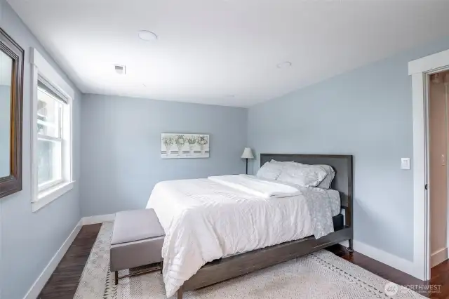 Primary bed set away from the other 2 bedrooms