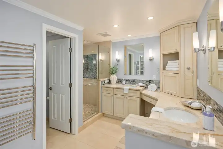 The toilet is separate from the rest of the bathroom (not in the picture the walk-in closet).