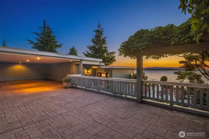 The house enjoys a direct drive-to access and covered parking + additional parking (rare locally for beachfront homes).