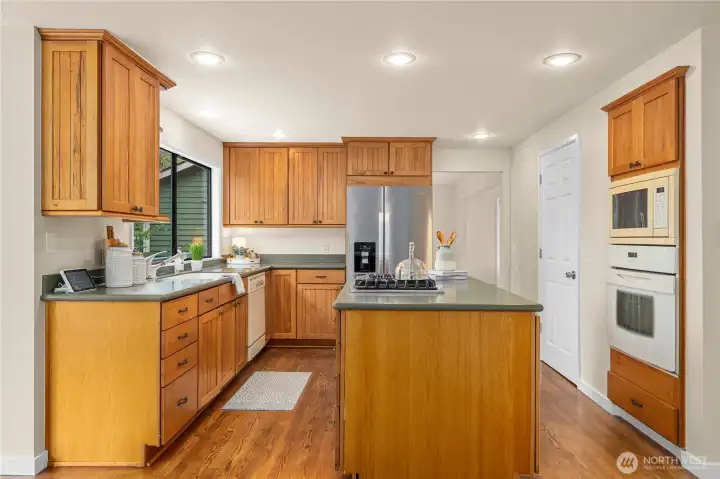 There is plenty of cupboard and cabinet space in this spacious kitchen.
