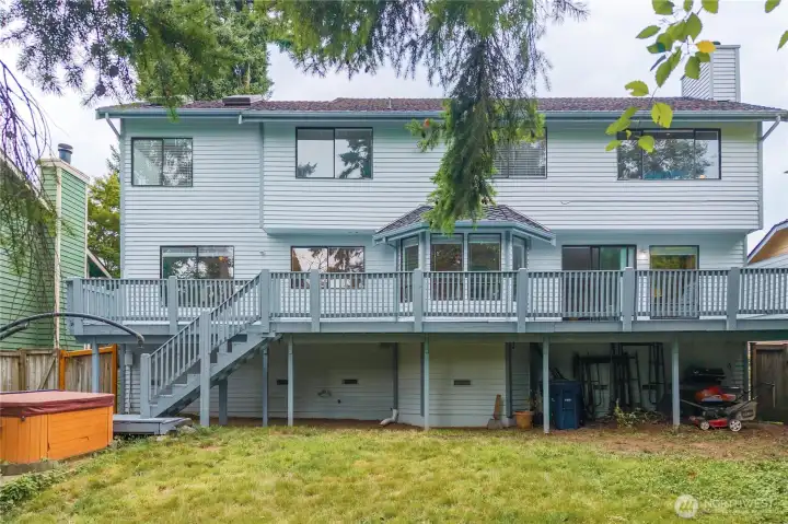 This view of the back of the house shows access to the walk in crawlspace.
