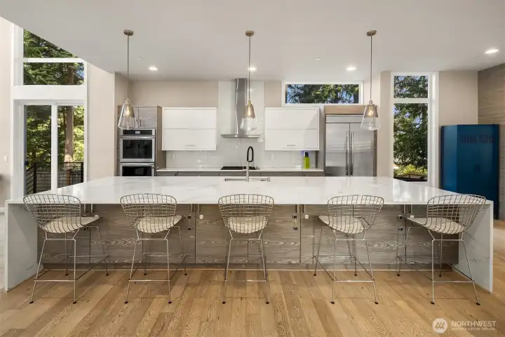 16 foot waterfall island is the heart of the home