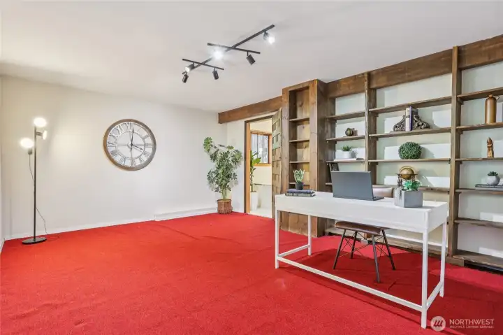 Spacious walk-out basement room offering endless possibilities—home office, extra living, or flex space.