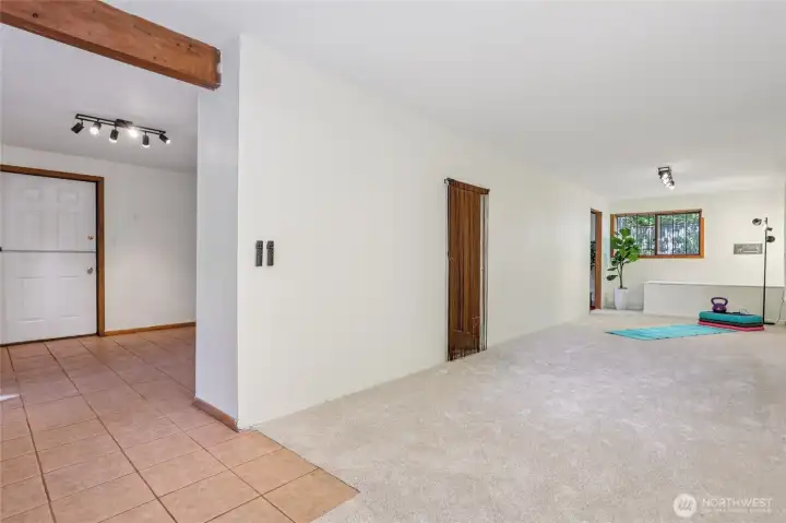 Flexible lower-level living space—perfect for fitness, wine collection, or everyday storage.