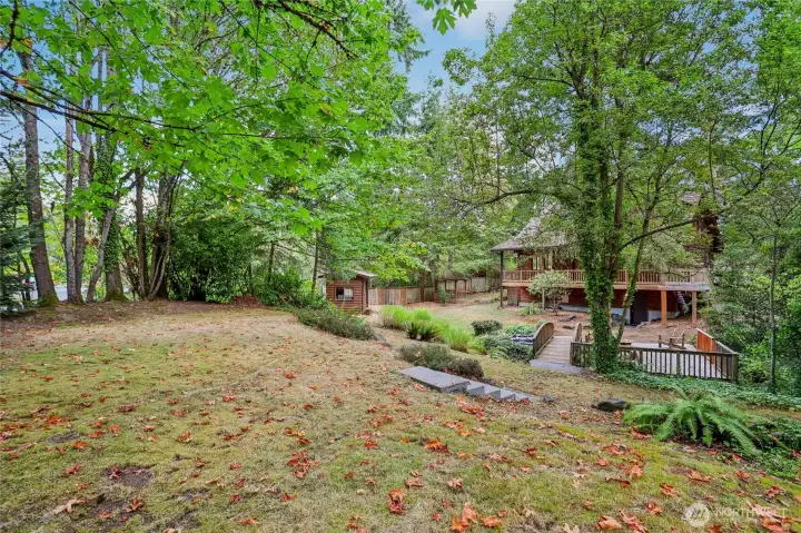 Expansive flat yard perfect for gardening or outdoor sports.