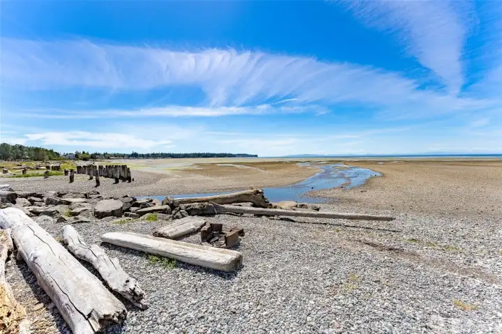 The Grand Bay beach with Terrell Creek ending here into the bay.  Kayaks, paddleboards...low tides provide a lot of soft sand for beach combing, clamming and small boats can be anchored for crabbing August through October crab season.