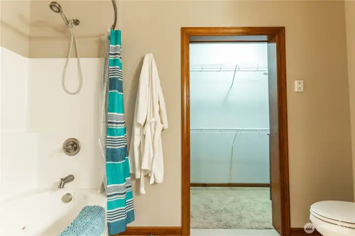 Spacious primary bedroom closet.