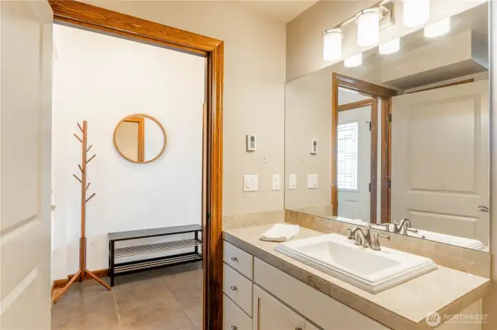 Second bathroom is also radiant floor heated just to the right of the entry across the hall from the second bedroom.