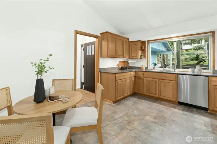 Flexibiity is paramount in this layout - a pocket door is in the wall seen here if you prefer to close off the front door when guests are arriving.