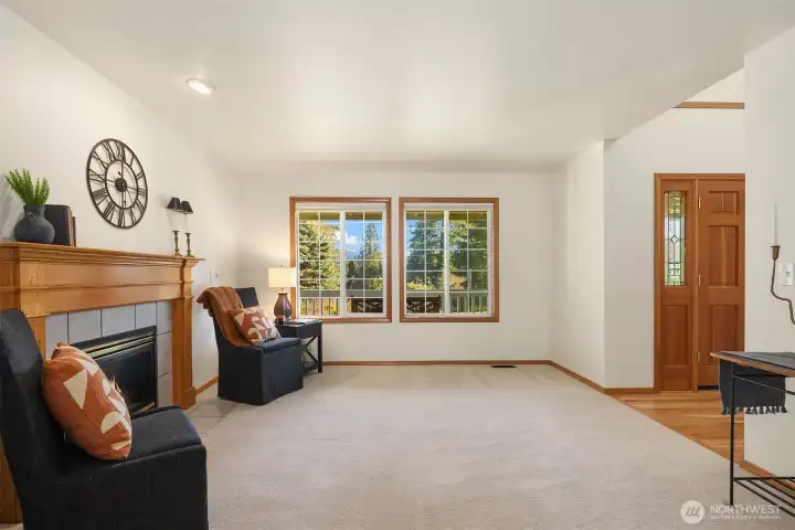 Formal Living Room with propane fireplace. Mountain view.