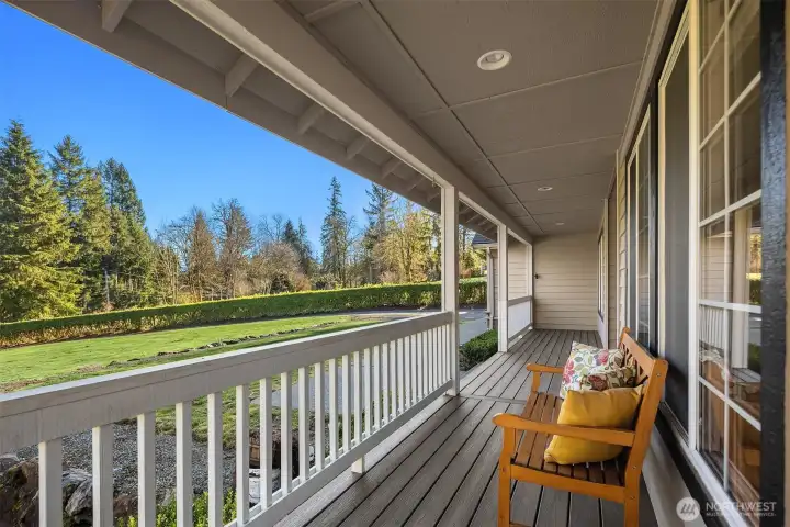 Large country covered porch to enjoy the mountain and "peek-a-boo" lake view.