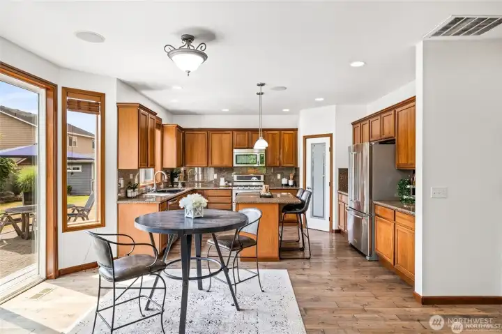 The kitchen connects seamlessly to the family room for easy living.
