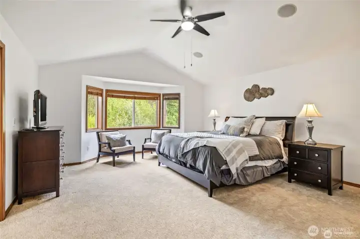 Large, sun-filled primary suite designed for relaxation.