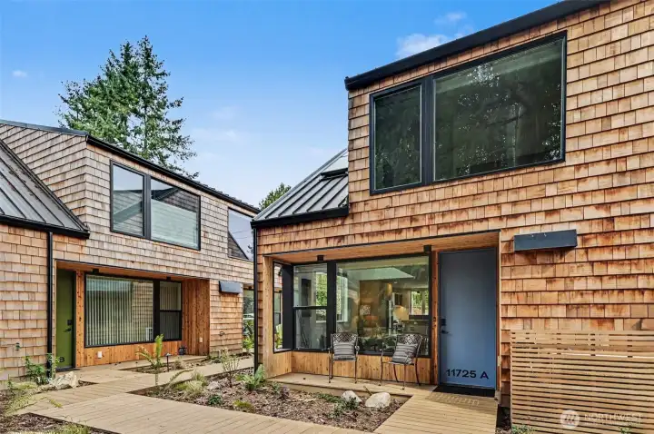 Back patio facing the community space, facilitating connectedness