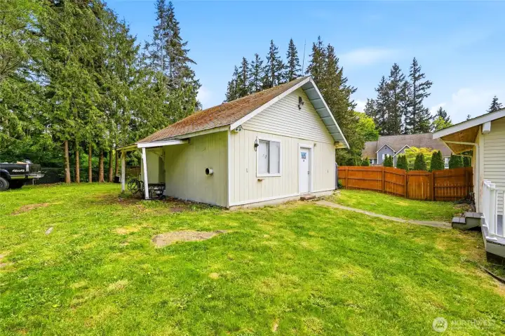 Detached 2-car garage/shop with roll up garage door on back