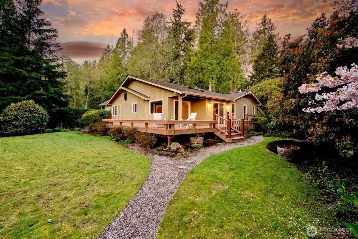 Tucked into the heart of historic Port Madison, this charming one-level bungalow is set on a level half-acre with mature gardens and a circular drive, capturing a sense of ease and tranquility.