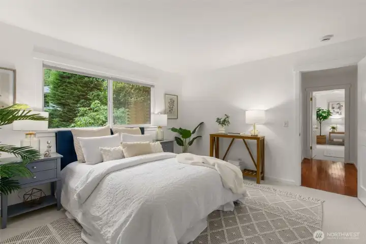 Bedroom number two with newly installed carpet and fresh paint.