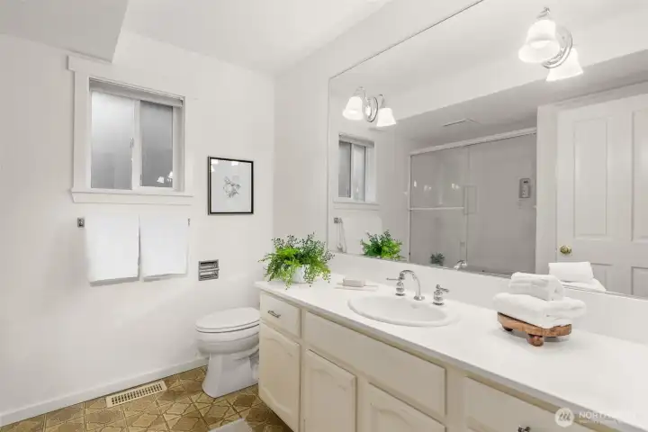 The full bath that serves bedroom number two.