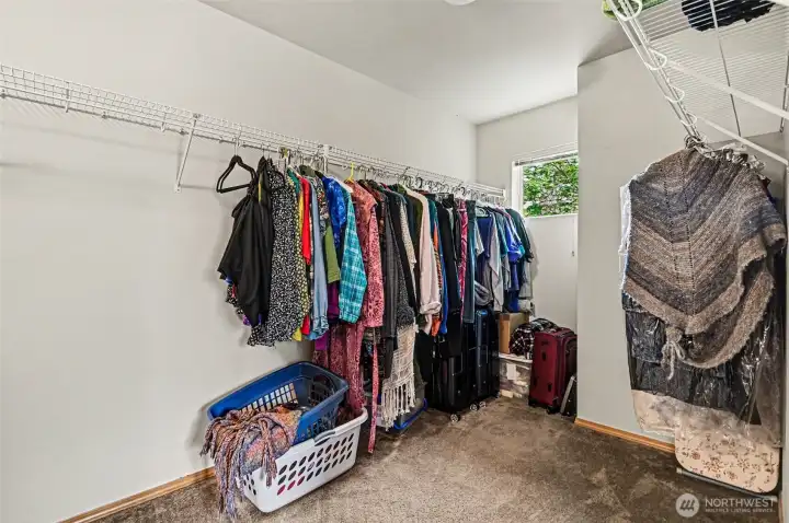 Primary walk in closet.