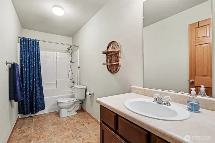 One of TWO full, guest baths on upper level