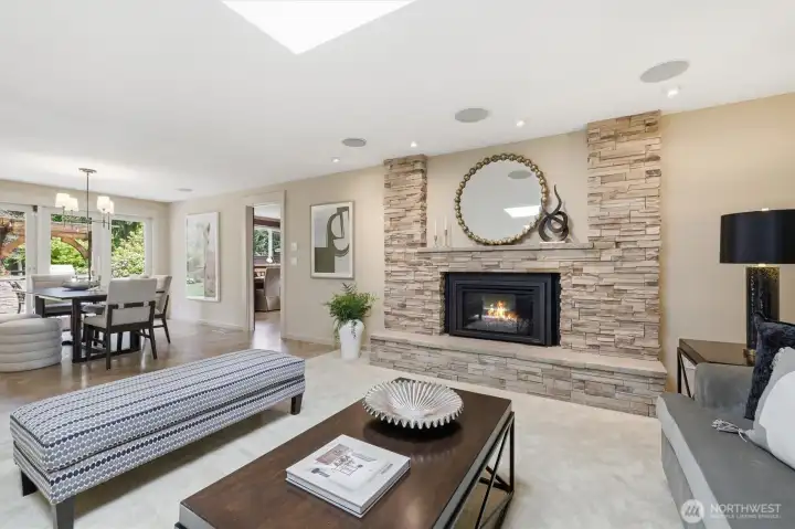 Gather around the cozy fireplace with masonry seating, mantel, & surround.