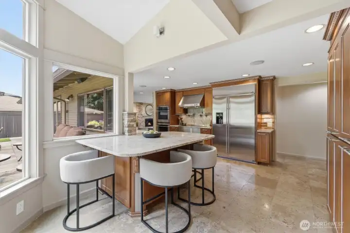 Lofty ceilings & bright windows make this an inviting spot for casual meals.