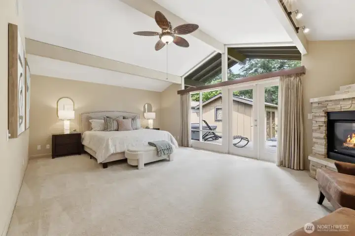 Cozy up to the fireplace, or open the French doors for a soak in the hot tub.