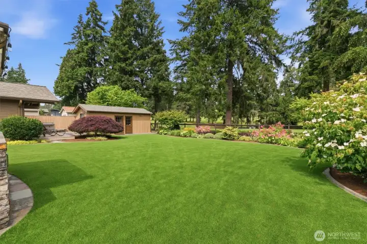 Looking toward the hot tub deck & outbuildings.