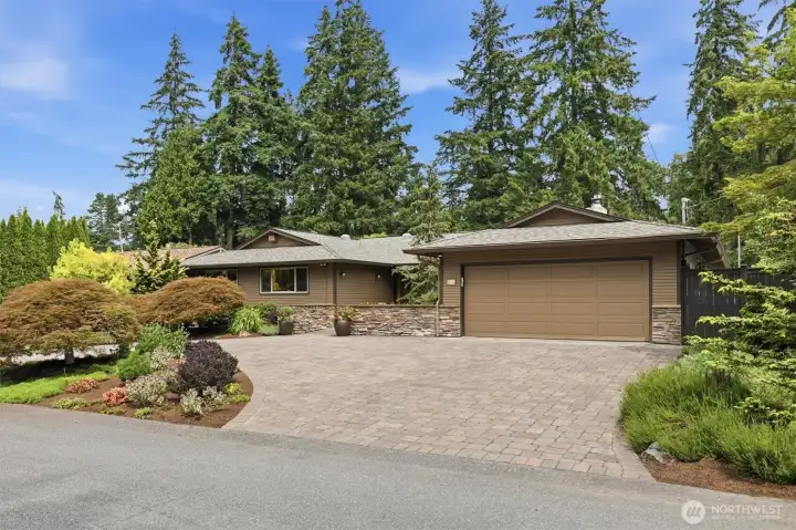 Wonderful, peaceful setting on a level street bordering the golf course.