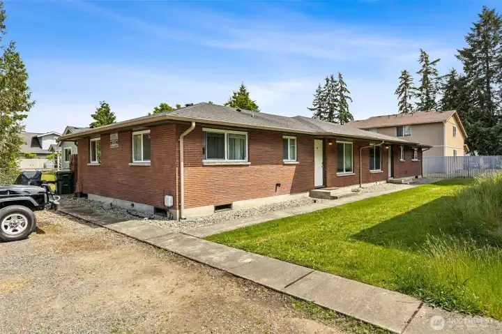 Well-built brick duplex adjacent to Pacific Lutheran University.
