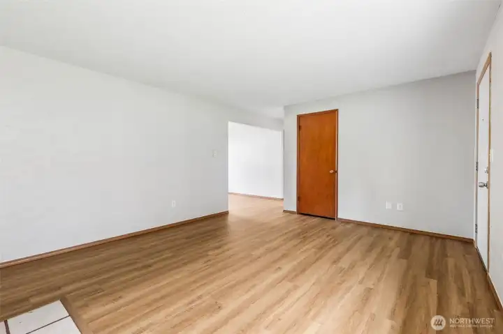 Large Living room. Beautiful newly installed  Laminate Vinyl Plank throughout the unit.