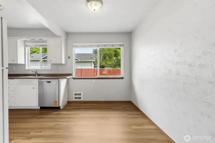 Dining area next to kitchen.