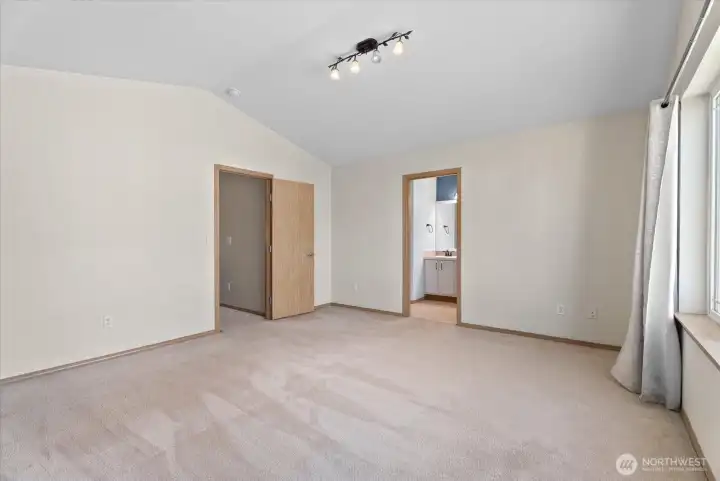 Another view of the primary bedroom