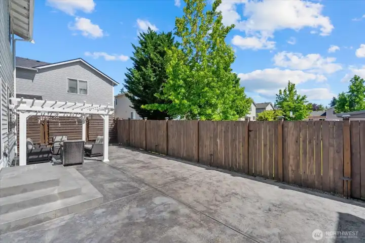 Stamped patio, pergola stays