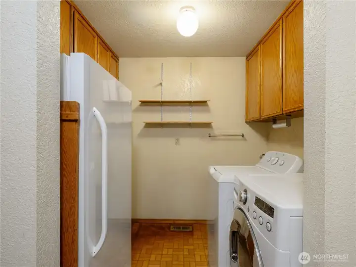 Laundry room with lots of storage. Laundry room with lots of storage.