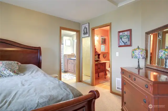 The primary bedroom suite is unique. You have double doors out to the wrap around view decks and a powder bath with walk in closet.