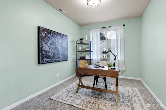Upper level has 4 bedrooms - this one is staged as an office.