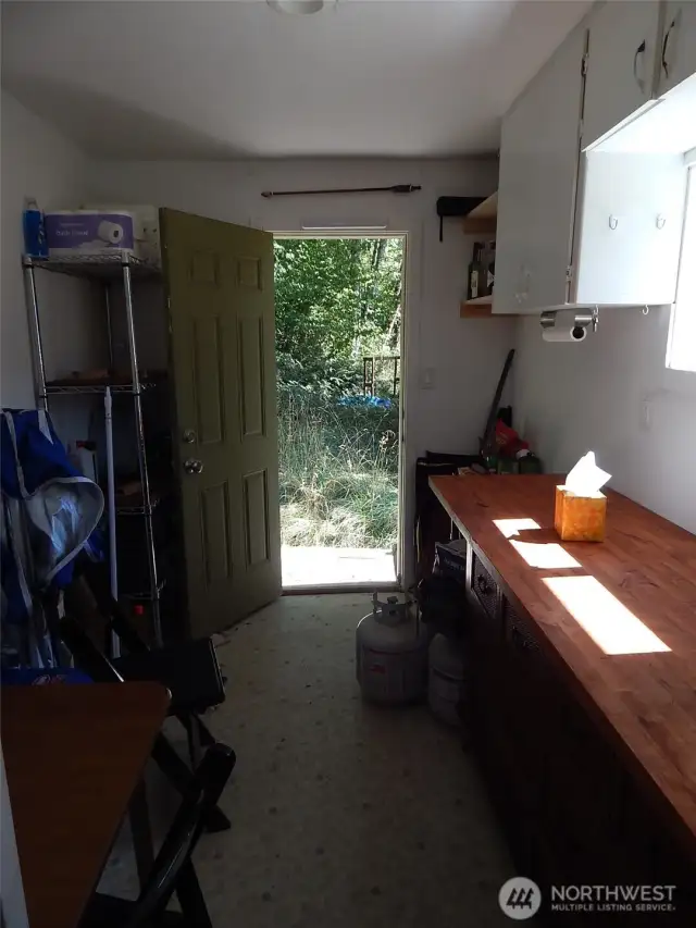 latrine Storage and table area.