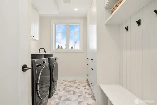 Laundry and mudroom located on the main level when you enter from the garage.