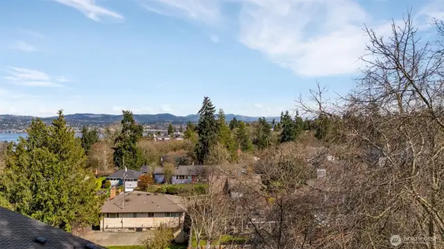 4 of 4 -- View from future front of 3-floor home’s roof deck, looking east.