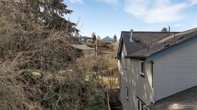 1 of 5 -- View from future back of 3-floor home’s top floor, looking West.