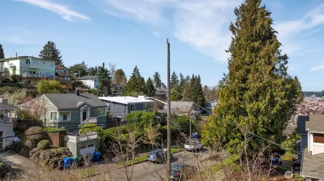 1 of 4 -- View from future front of 3-floor home’s top floor, looking NW.