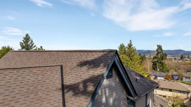 3 of 4 -- View from future front of 3-floor home’s top floor, looking NE.